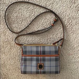 Dooney and Bourke crossbody w/registration card.
